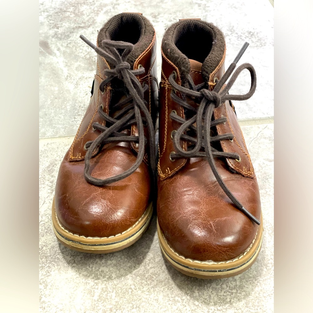 NWOT brown leather boots.